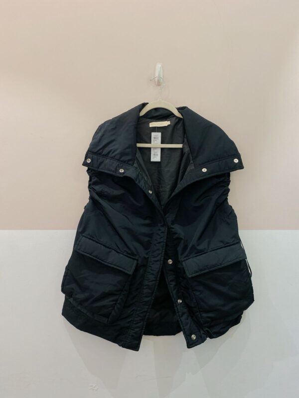 Colete preto bolsos Pitta U